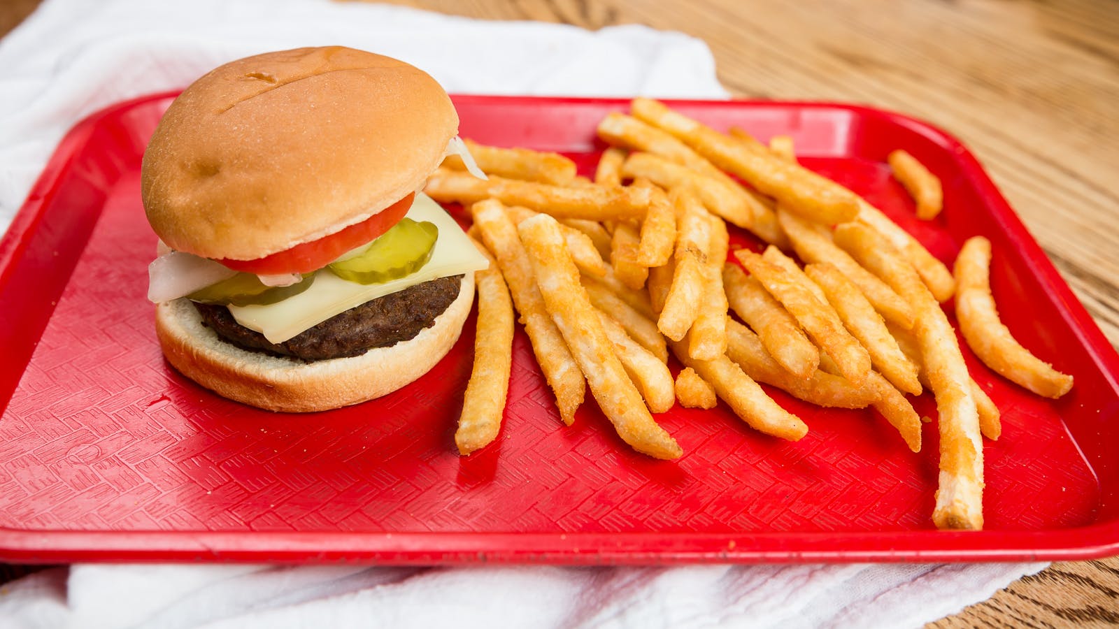 a sandwich and fries on a plate
