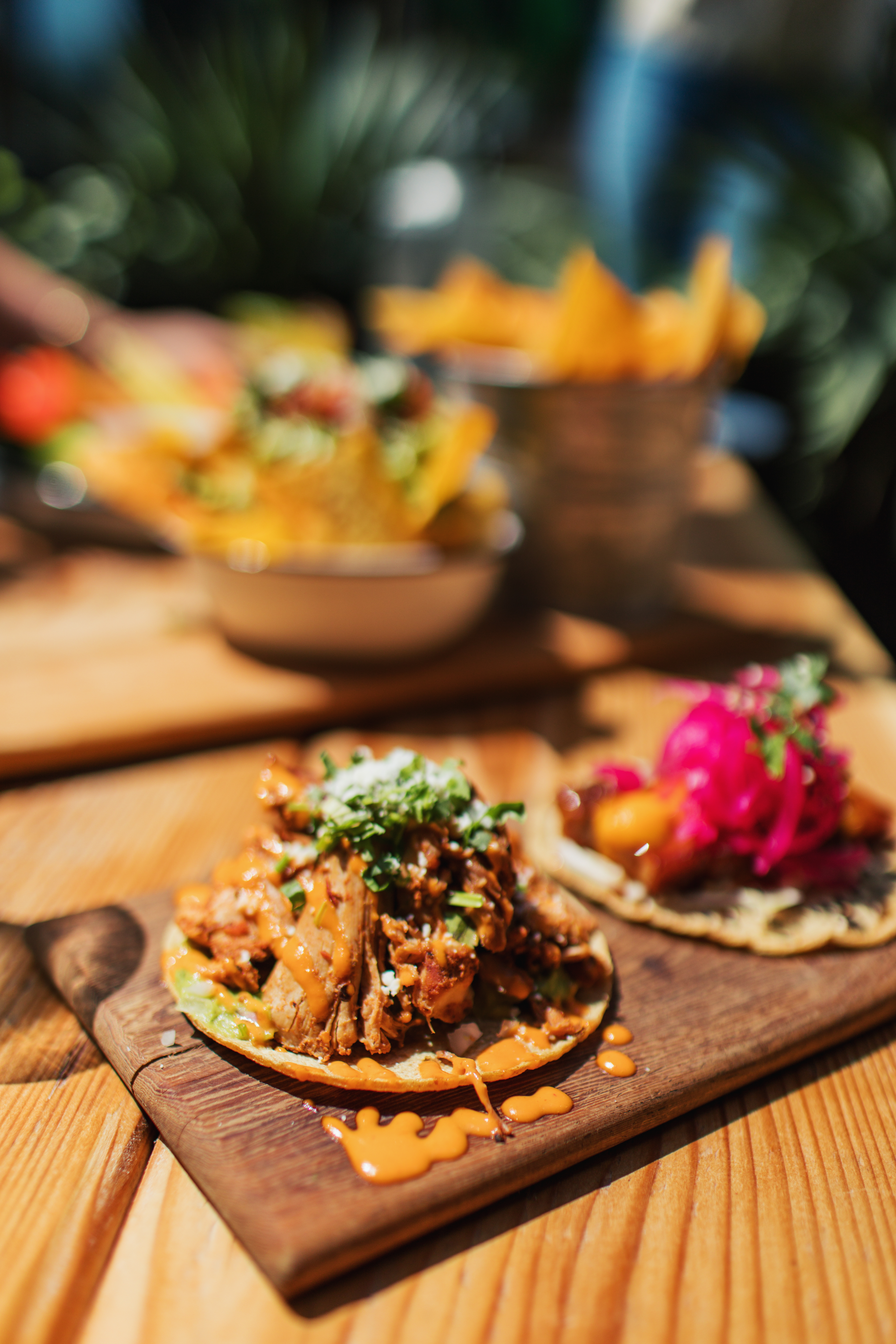 Dos Santos' Taco Tuesday special of two for one chicken tinga tacos and porky tacos