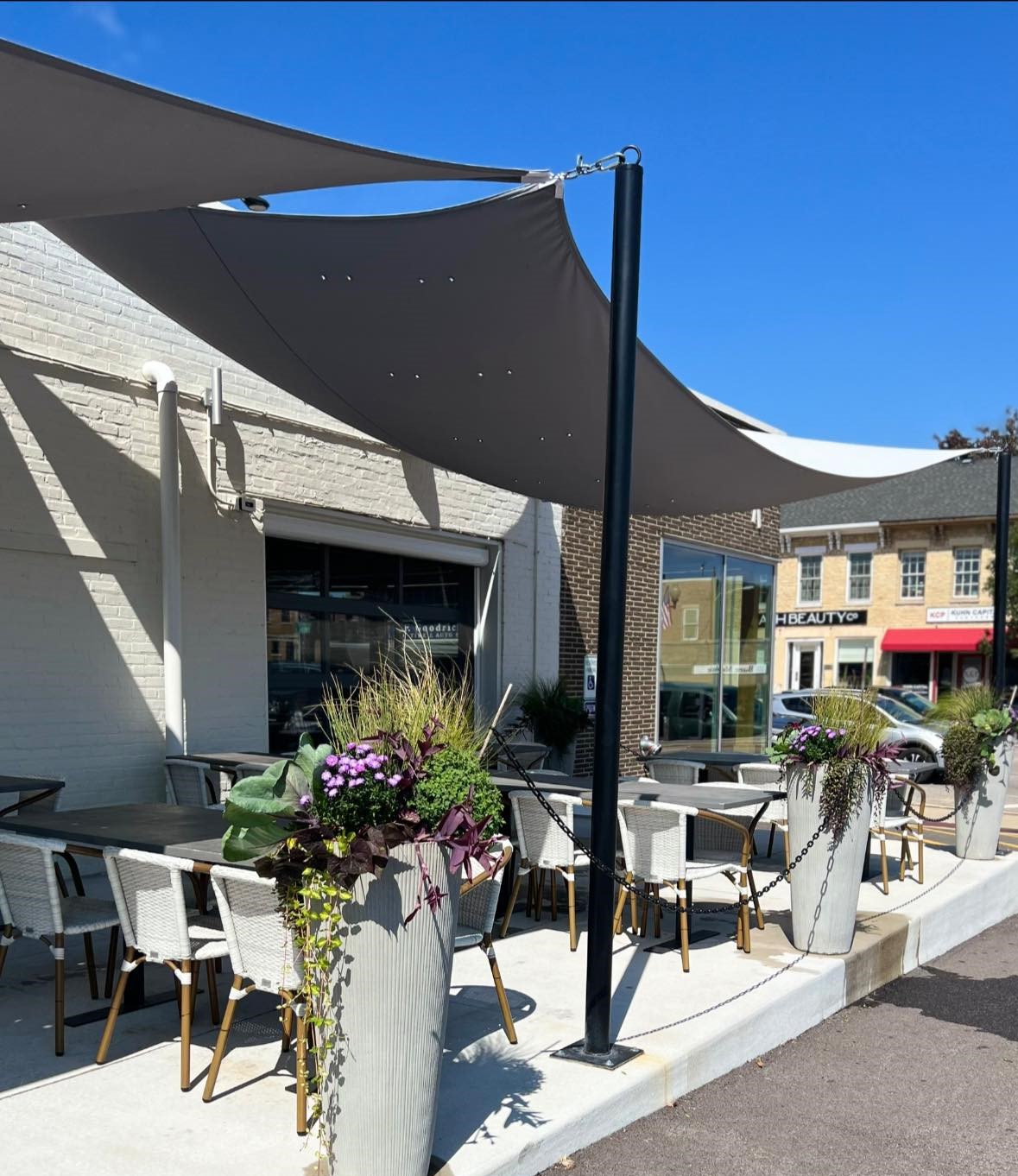 a group of people in front of a building