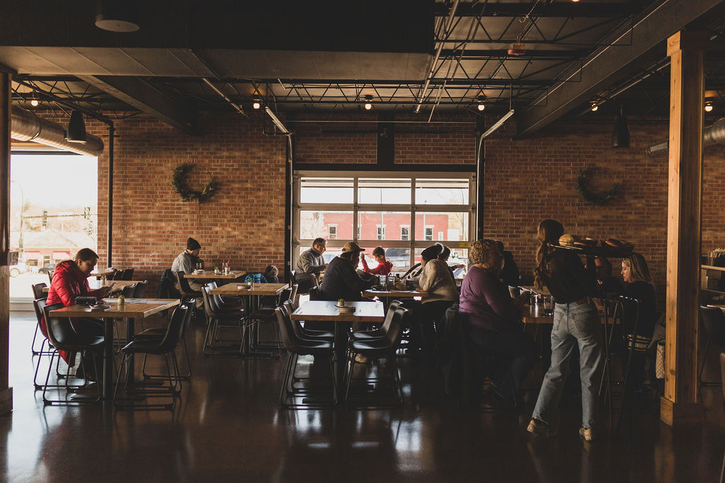 a group of people standing in a room