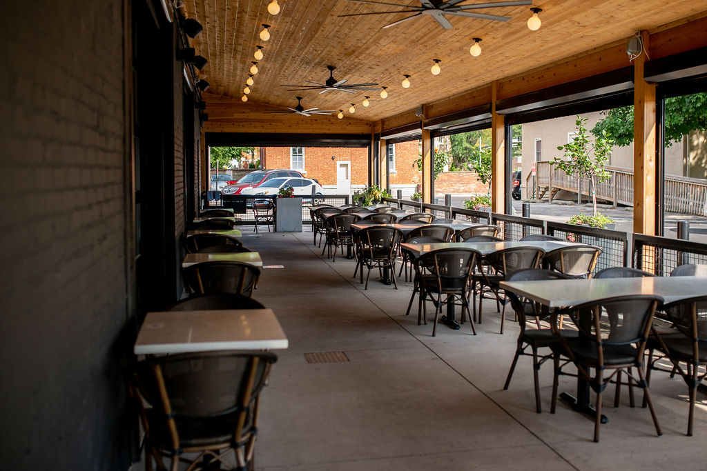 a dining room table in front of a building
