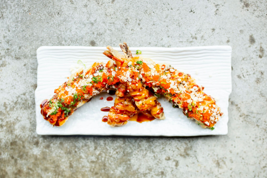 a half eaten slice of pizza