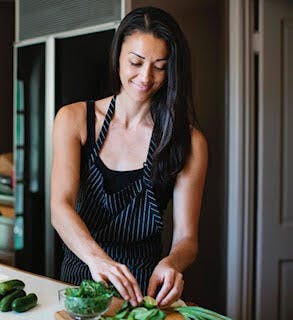 a woman sitting on a table