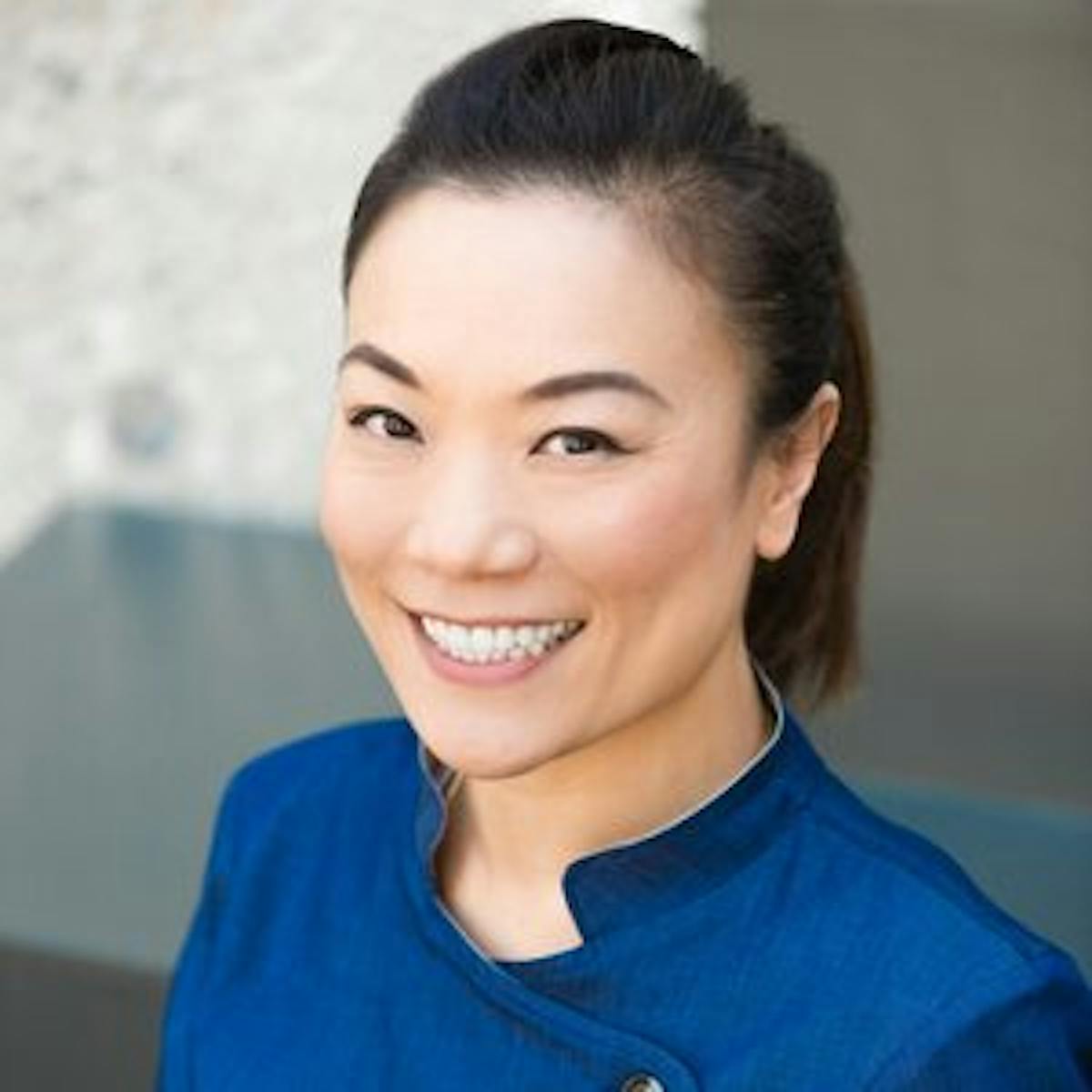 Shirley Chung in a blue shirt