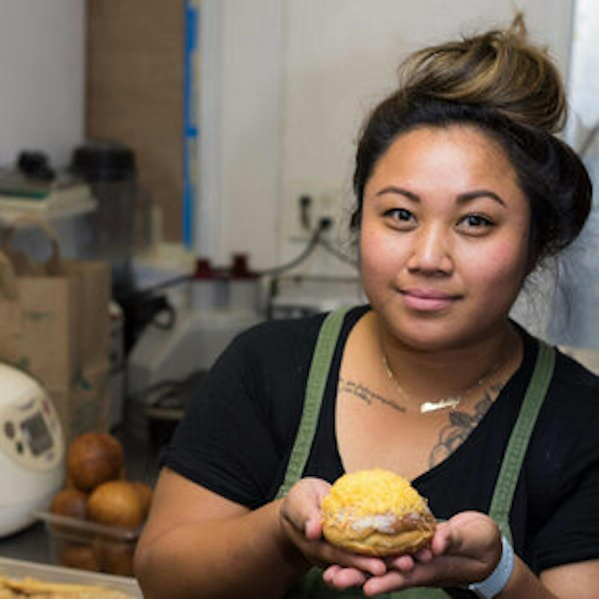 a woman holding a plate of food