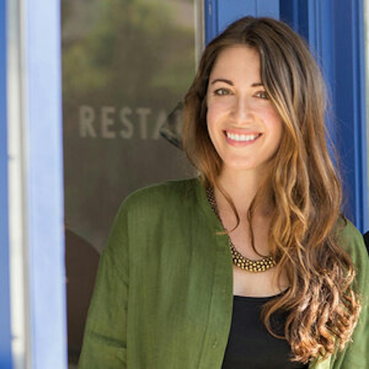 a woman smiling for the camera