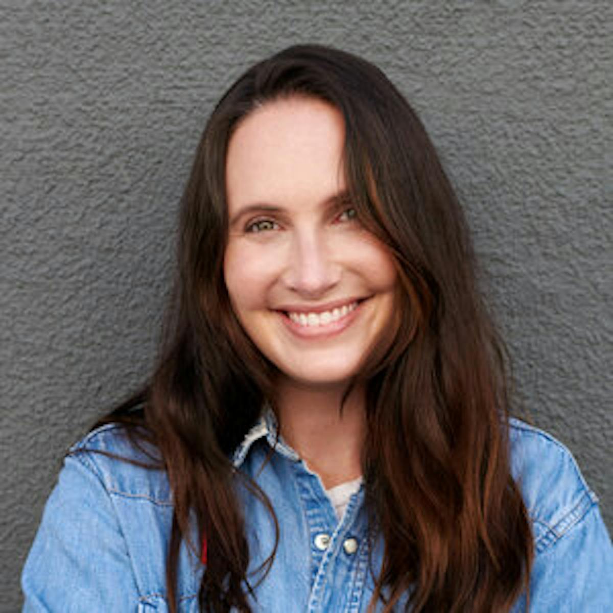 Debra Garrett smiling for the camera