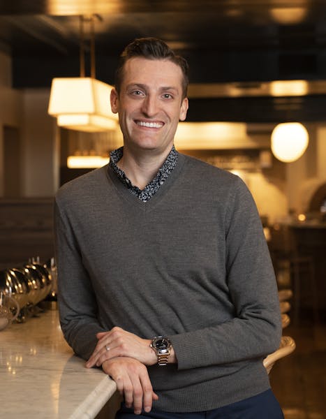 a person smiling for the camera