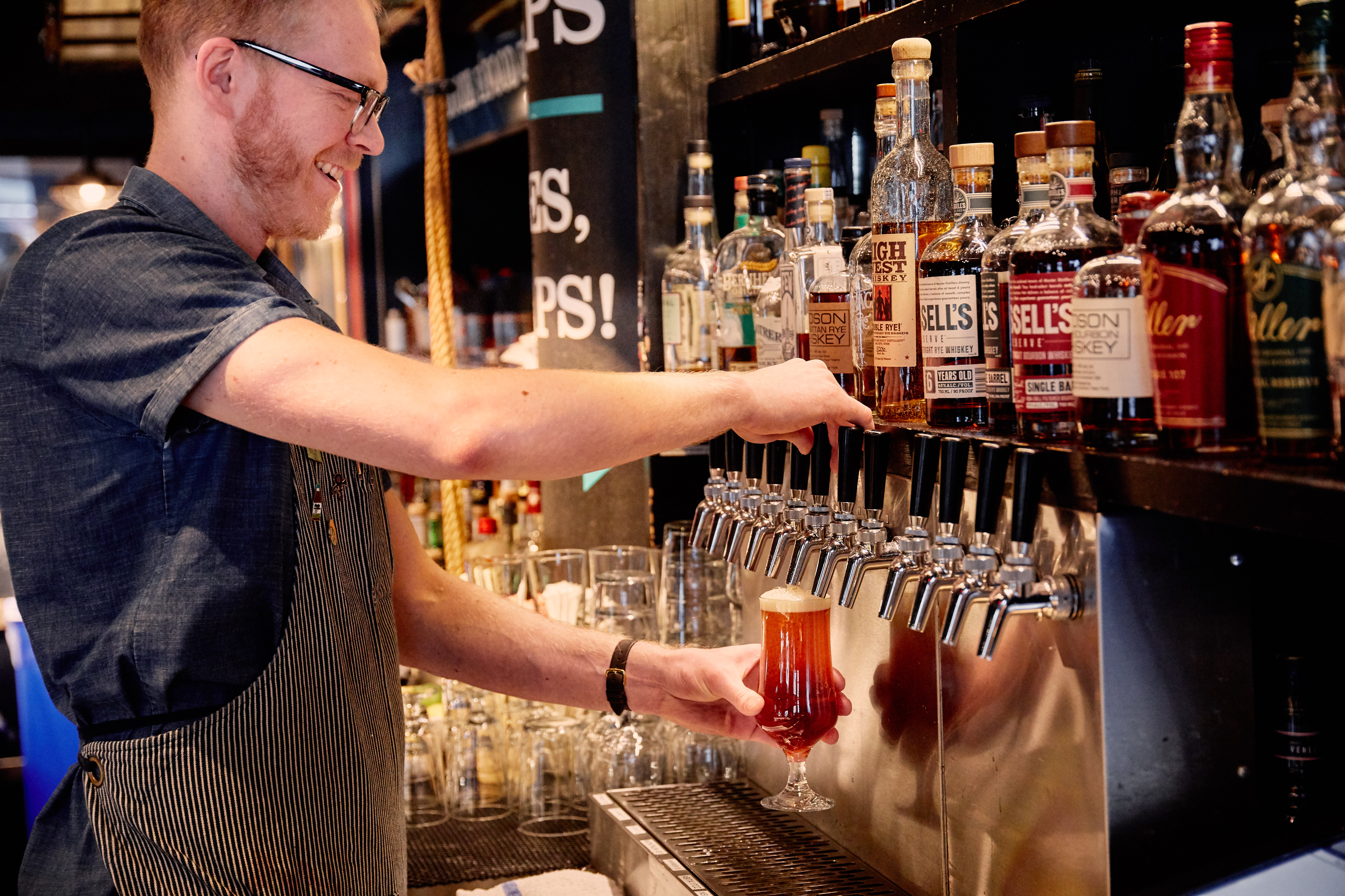a man cutting a cake