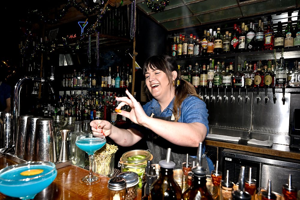 a person sitting at a table in a restaurant