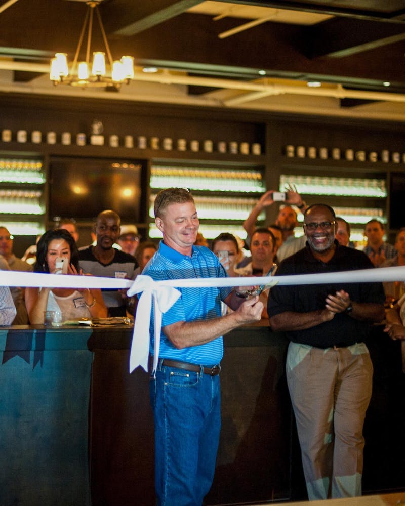 a group of people standing in a room