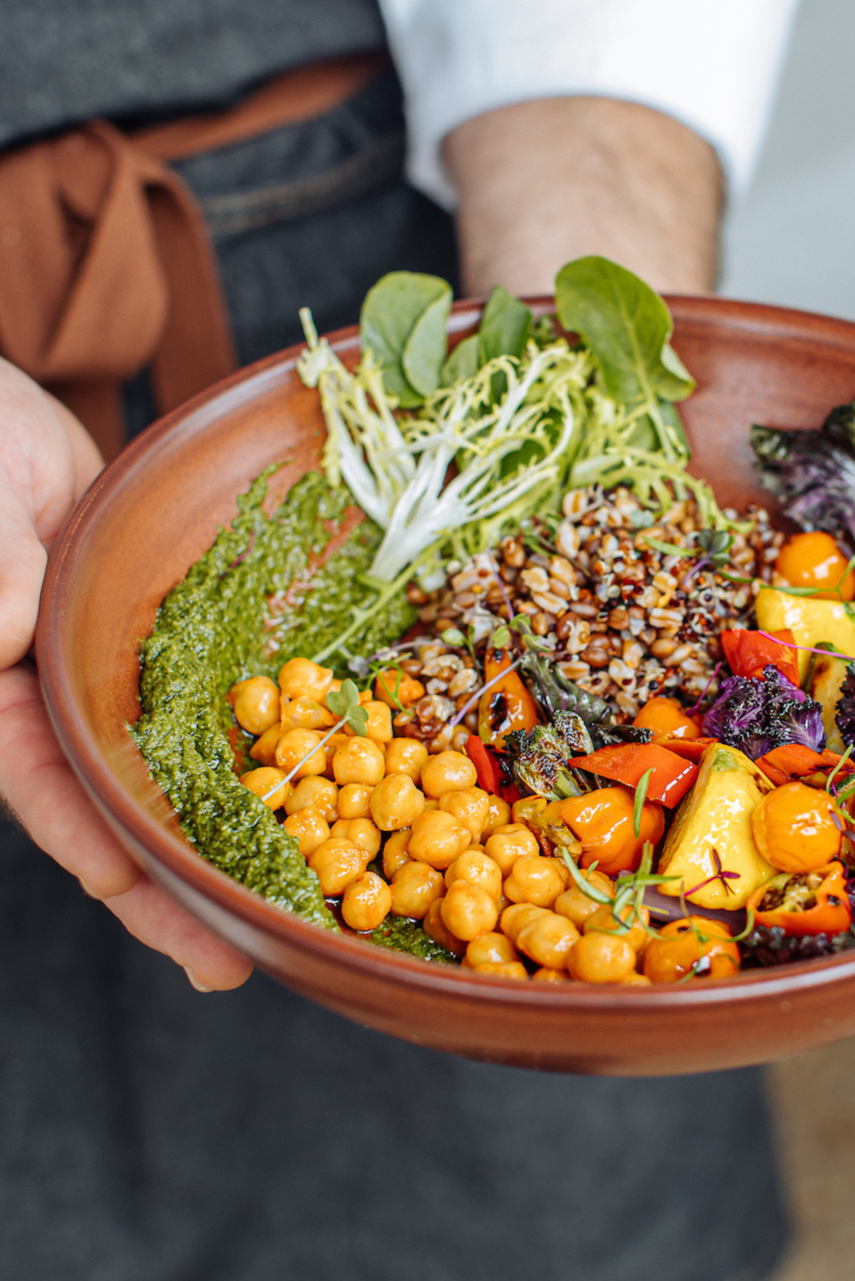 a person holding a plate of food