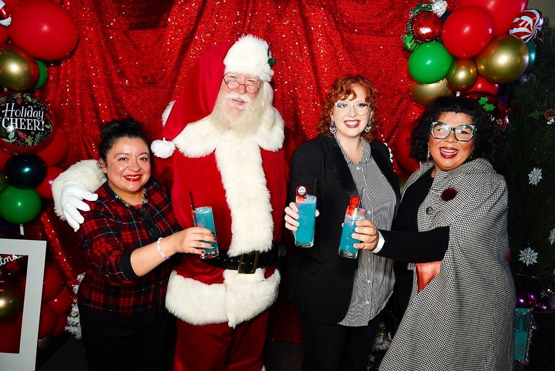 a group of people posing for the camera