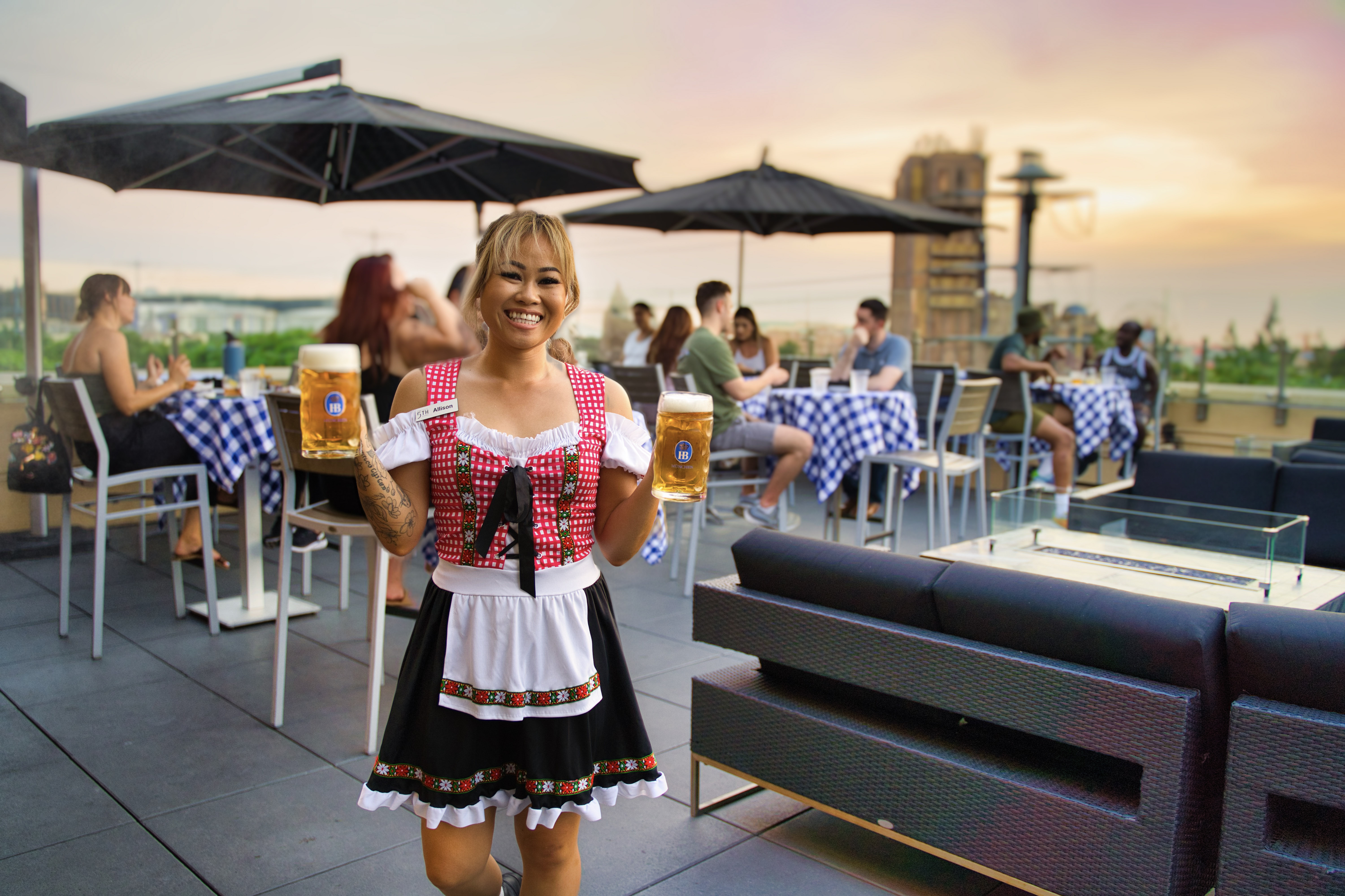 bartender holding beers