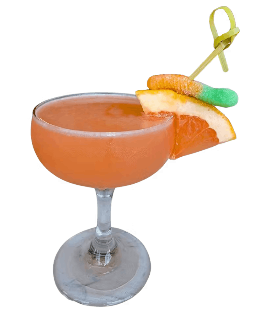 orange cocktail with a gummy worm, called YOU'RE A WORM WITH A MUSTACHE. Nosotros Blanco tequila apricot brandy lemon juice vanilla simple syrup Combier Pamplemousse rose fresh strawberries Elemakule Tiki bitters
