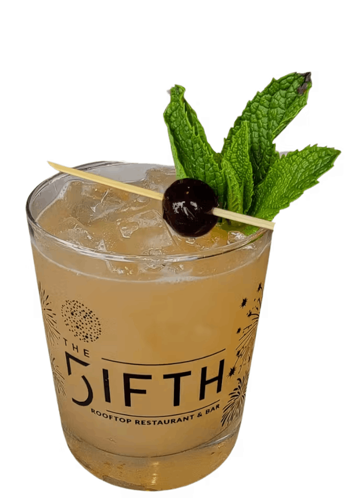 yellow cocktail with a cup saying The FIFTH (5ifth)