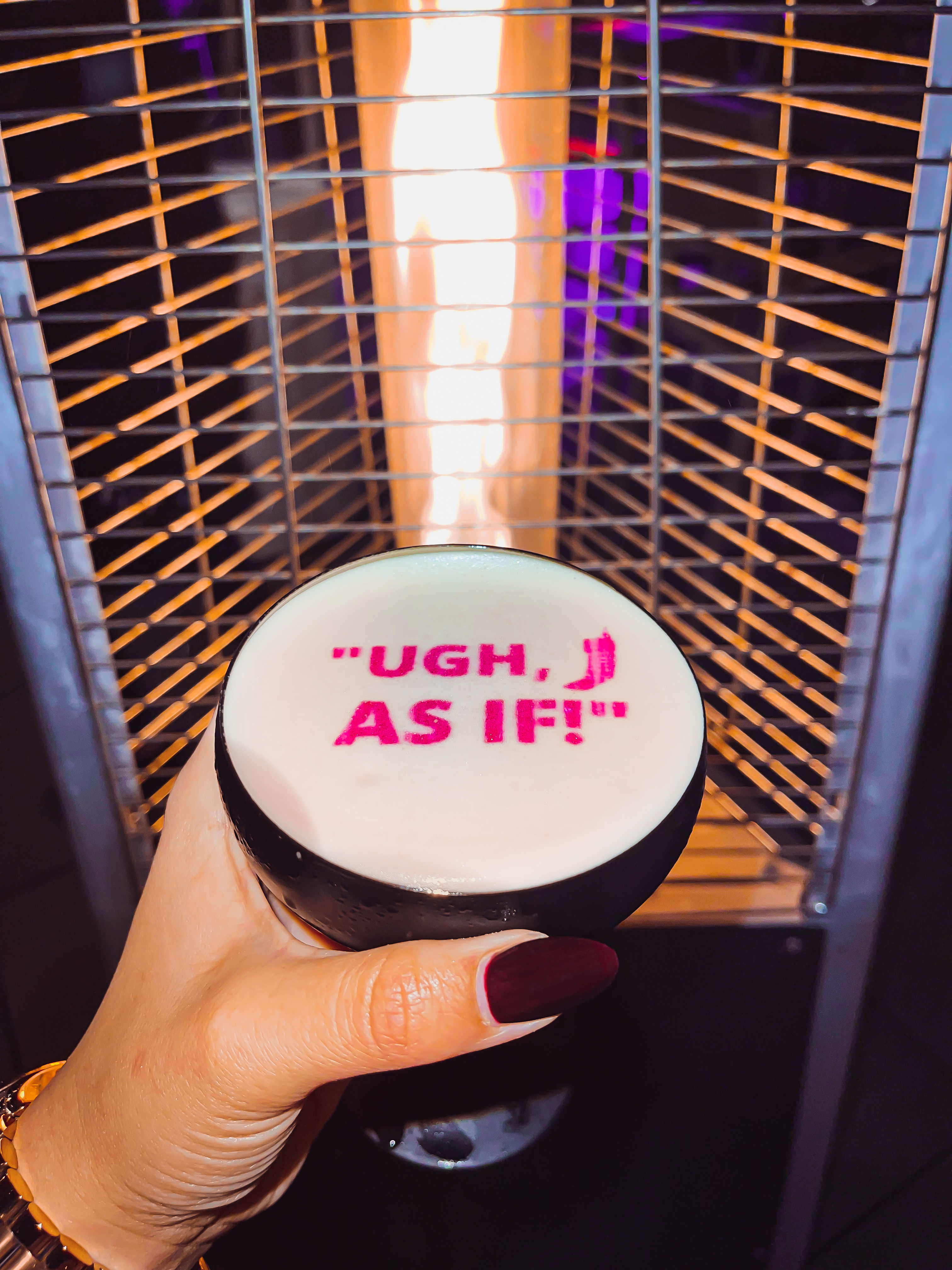 a person holding a drink