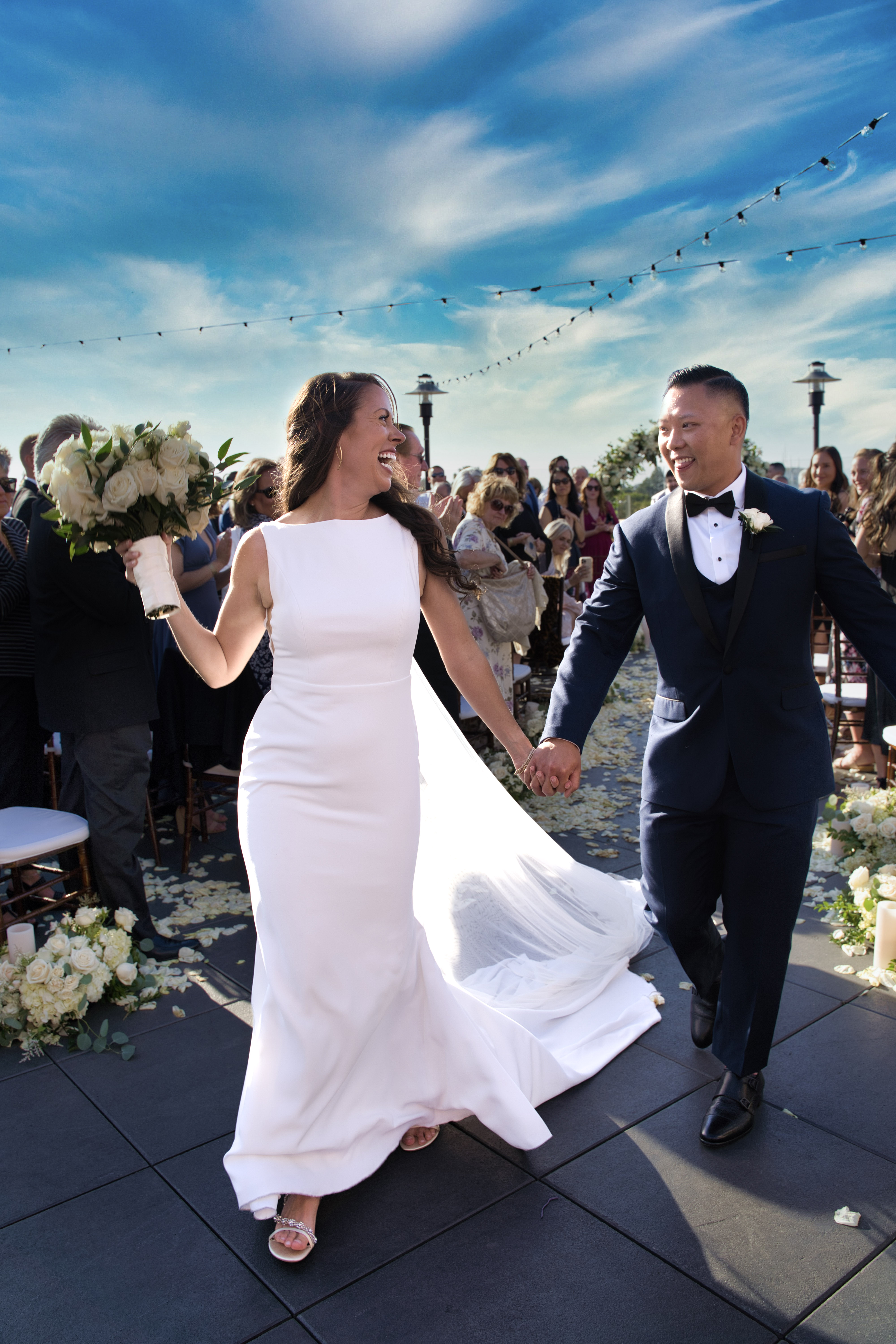 bride and groom walking down aisle