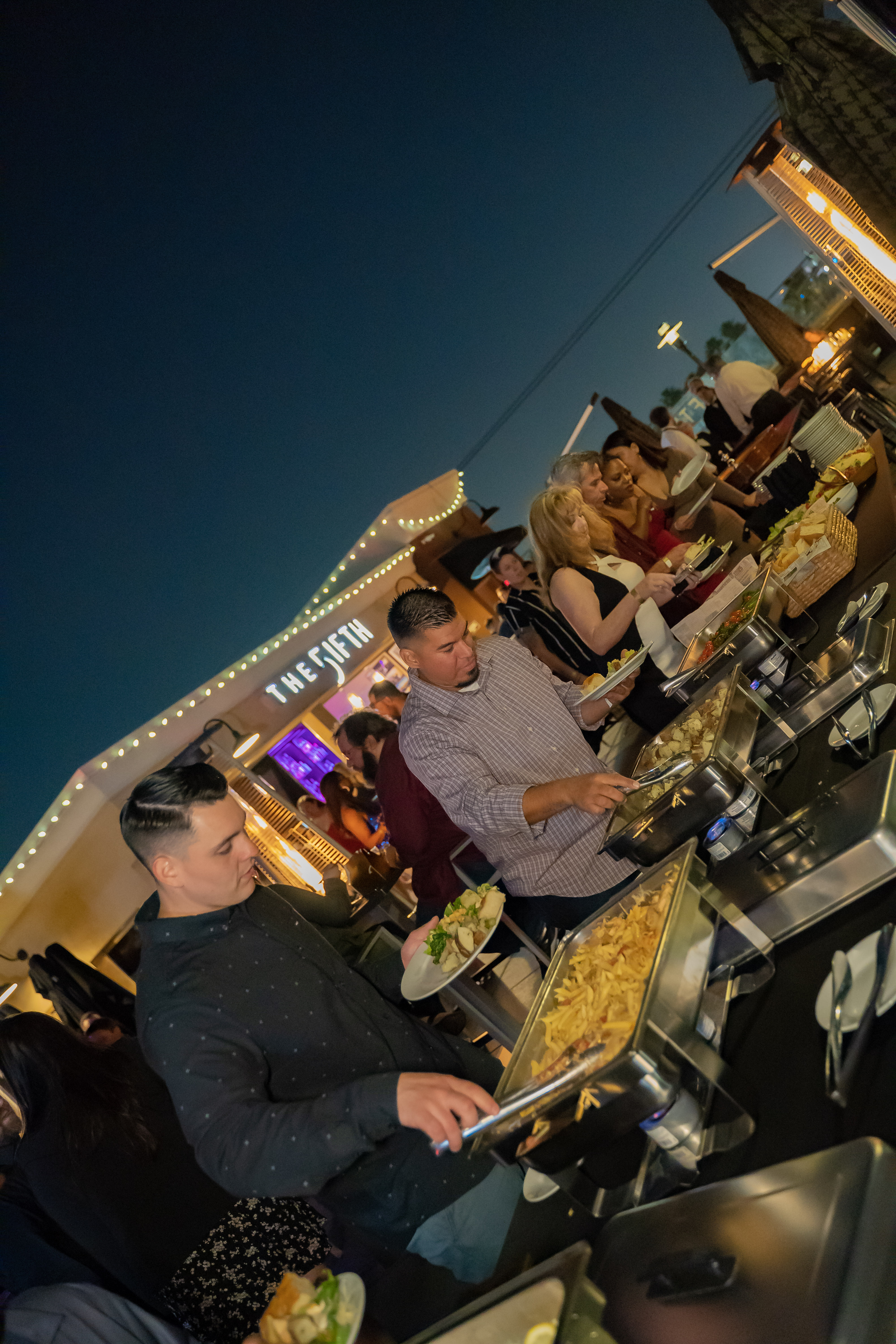 a group of people sitting at a table
