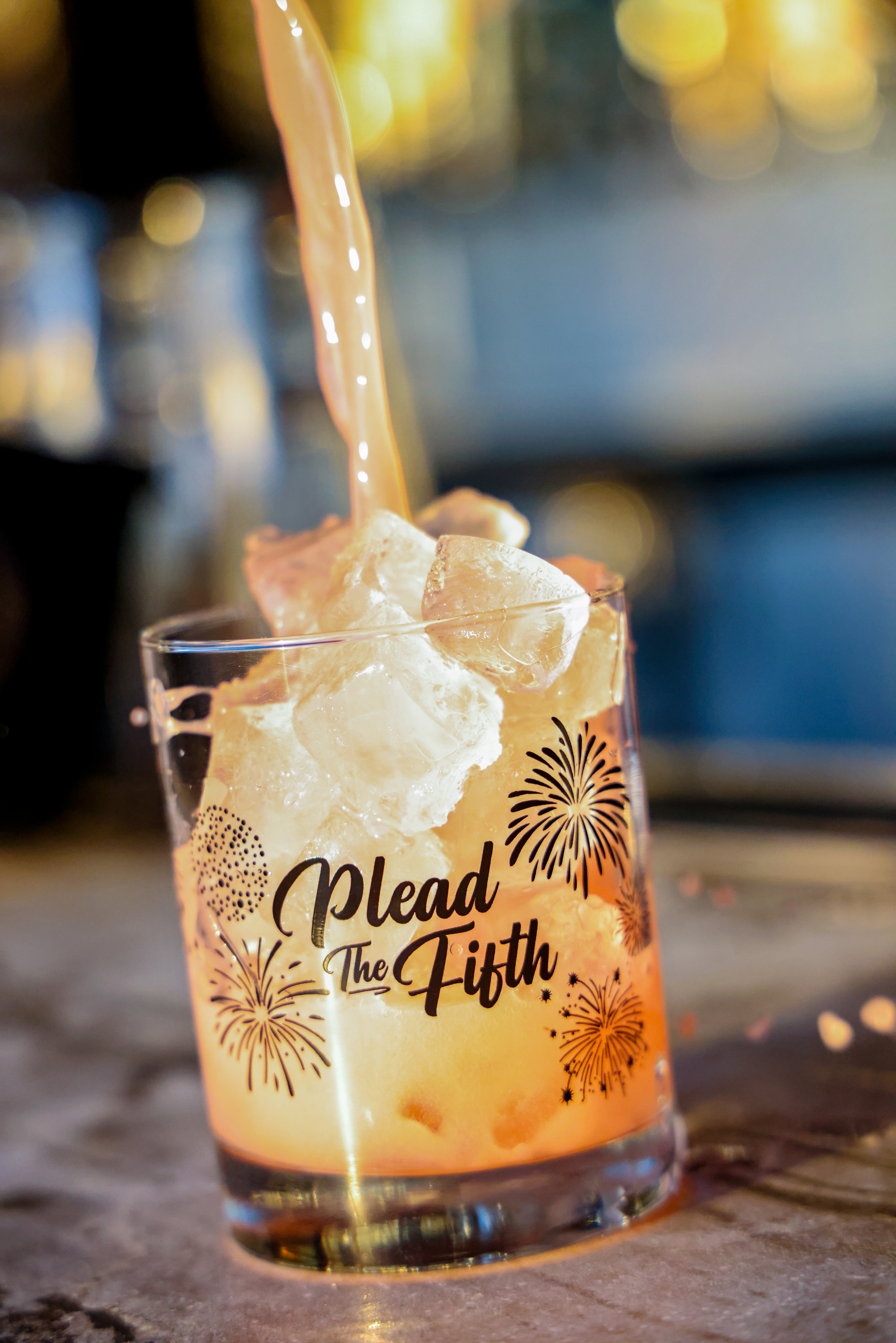 drink being poured in cup