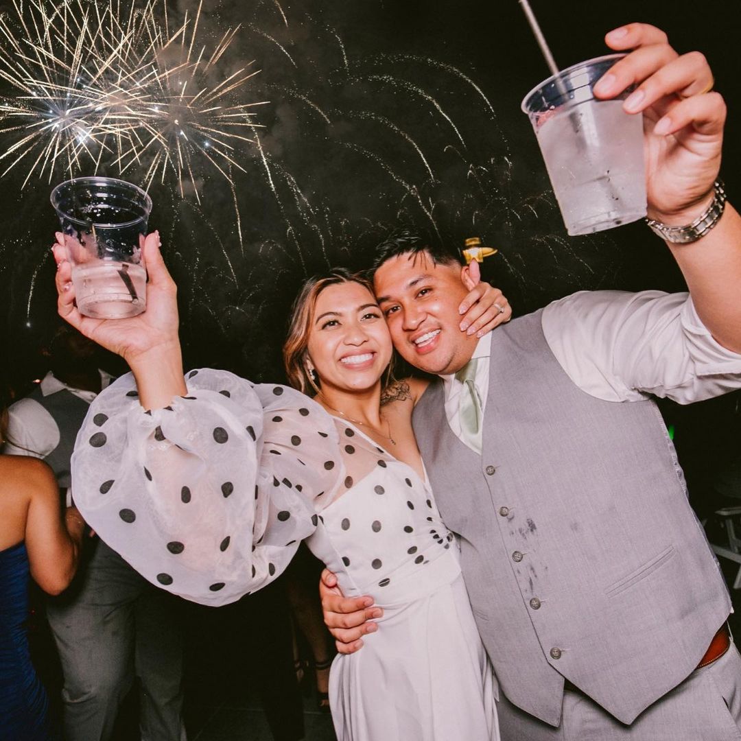 a group of people holding wine glasses
