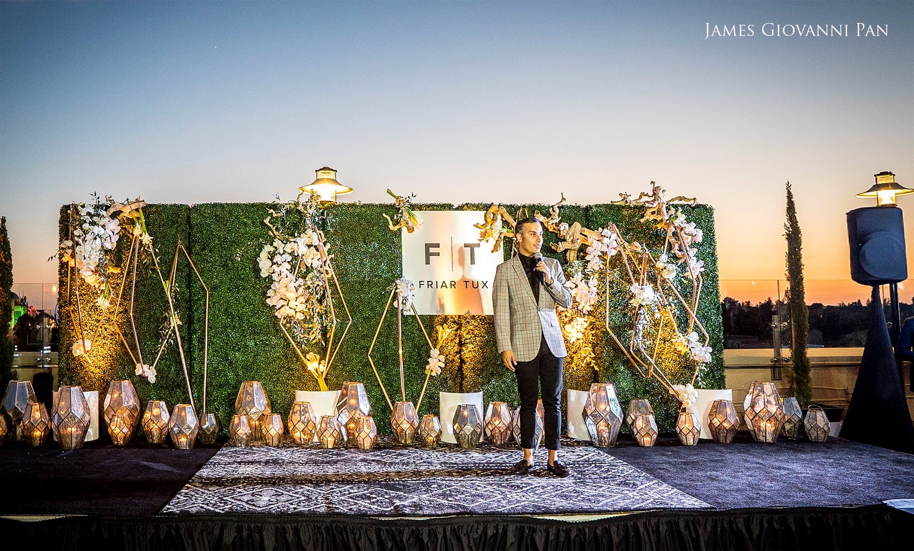 a group of people standing in front of a building