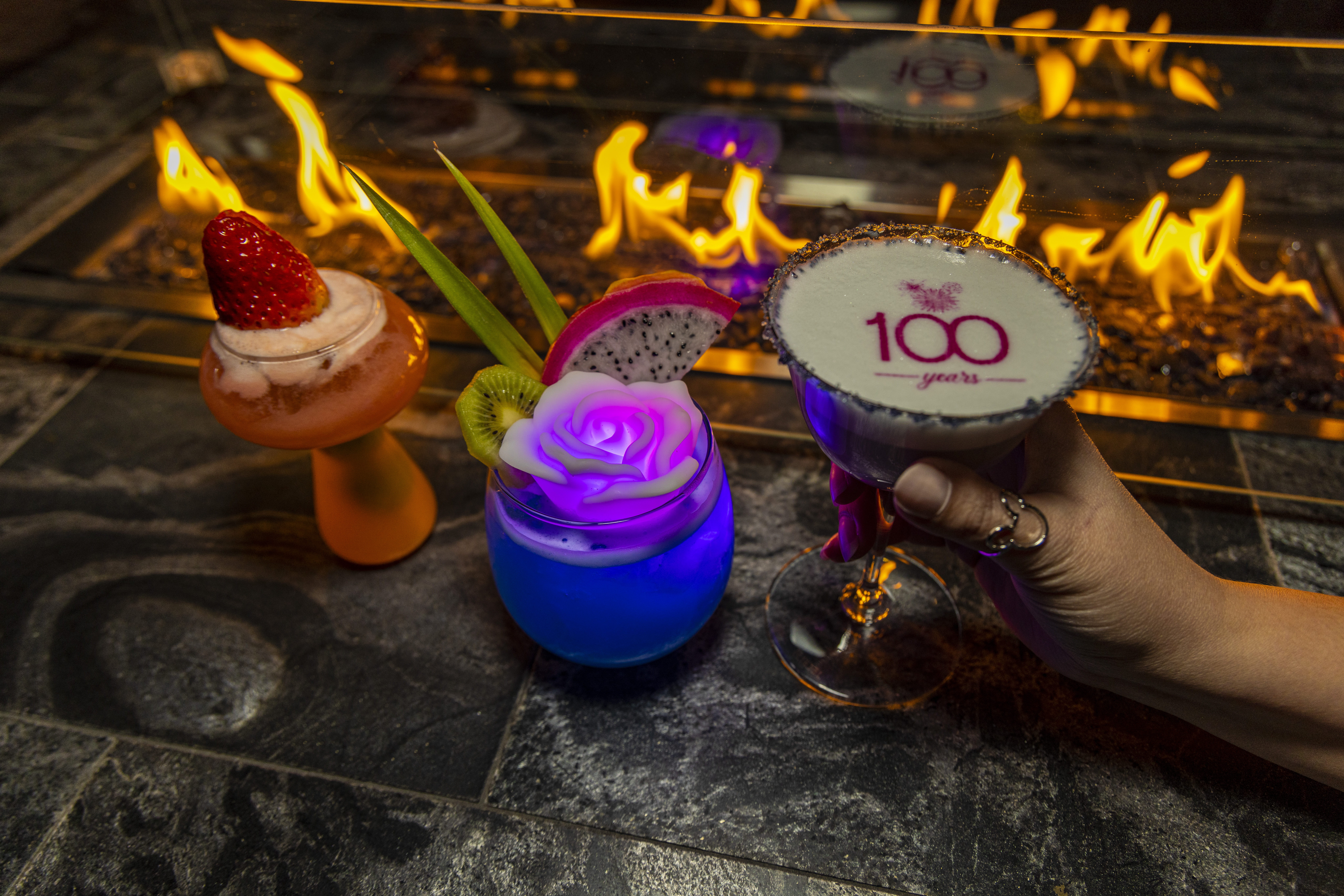 drinks in front of fire