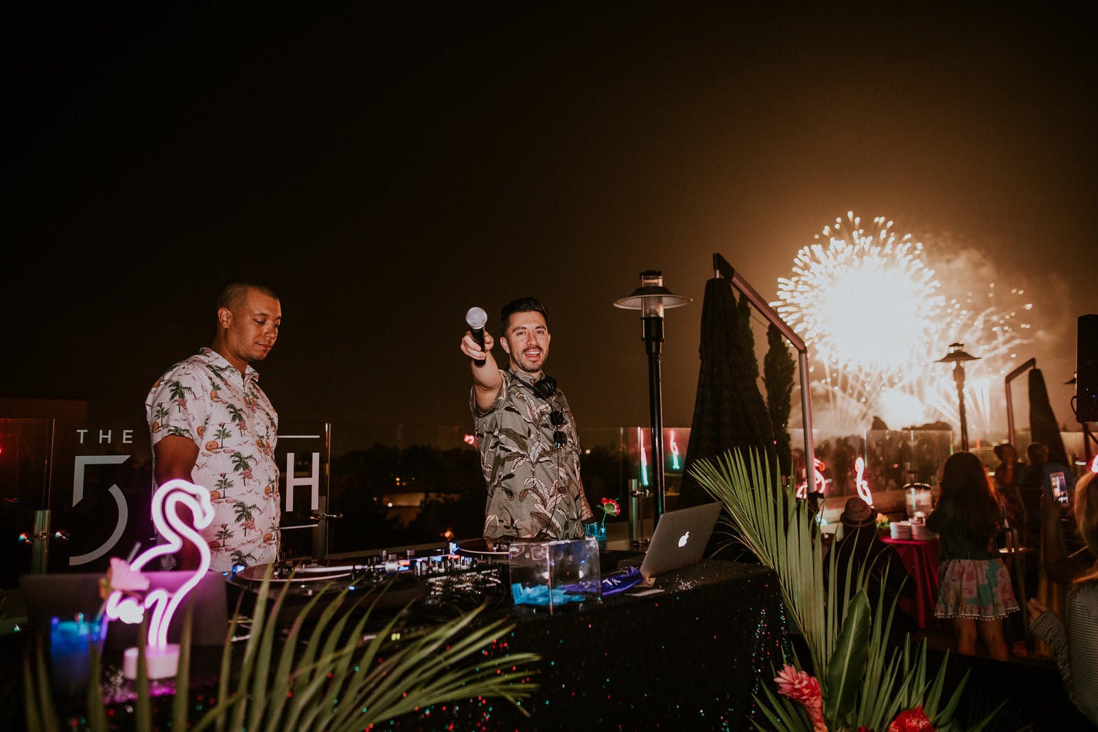 a group of people playing instruments and performing on a stage