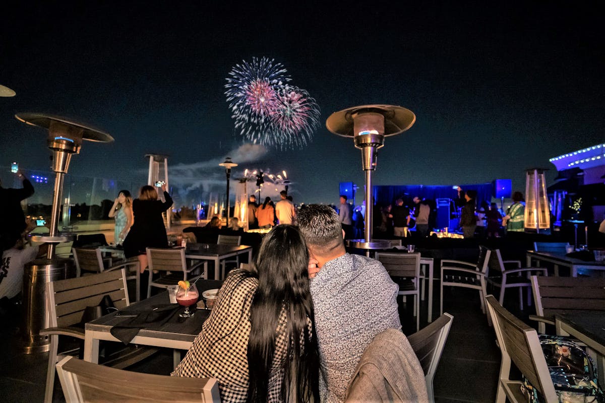 a couple watching fireworks