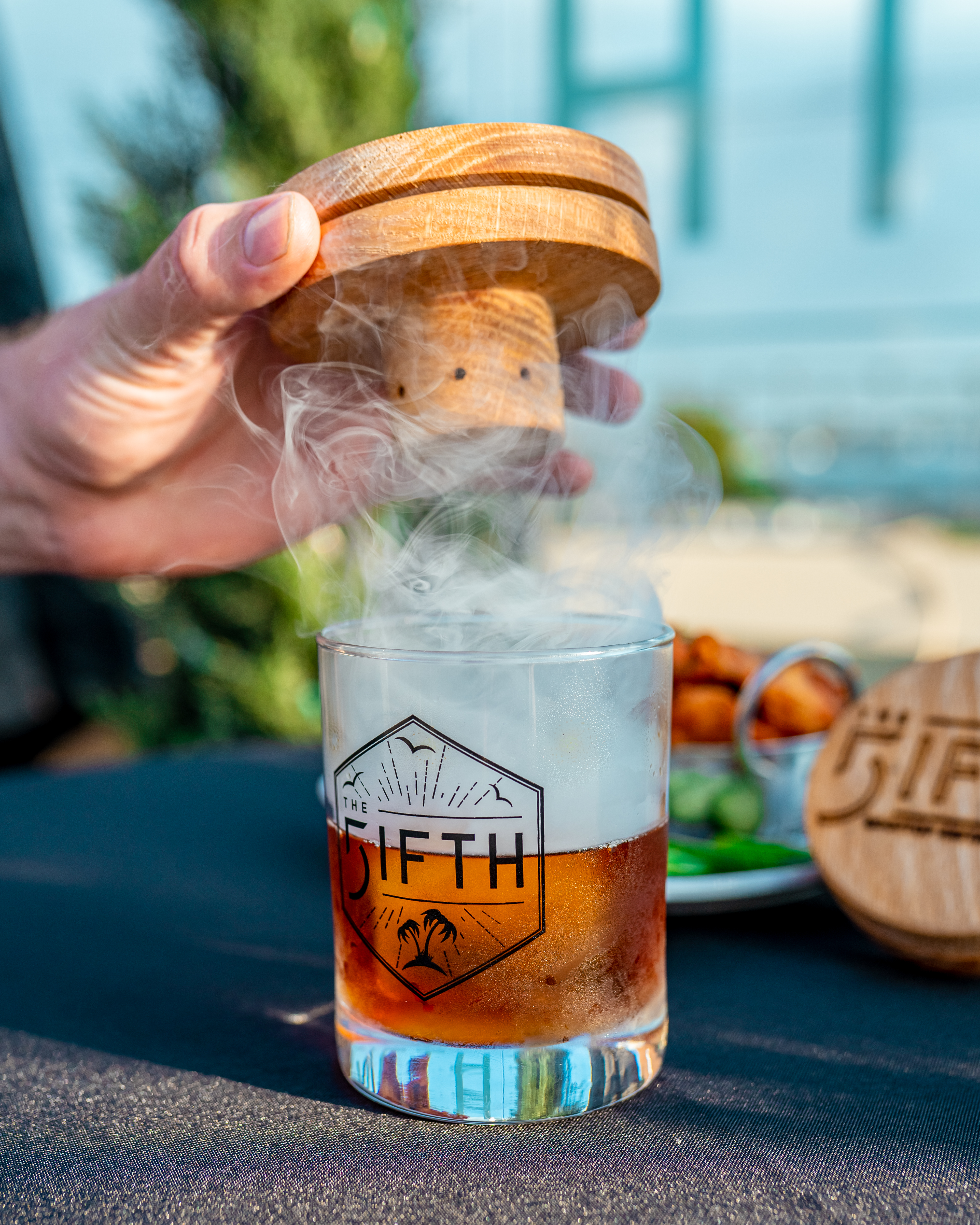 Whiskey cocktail with smoke