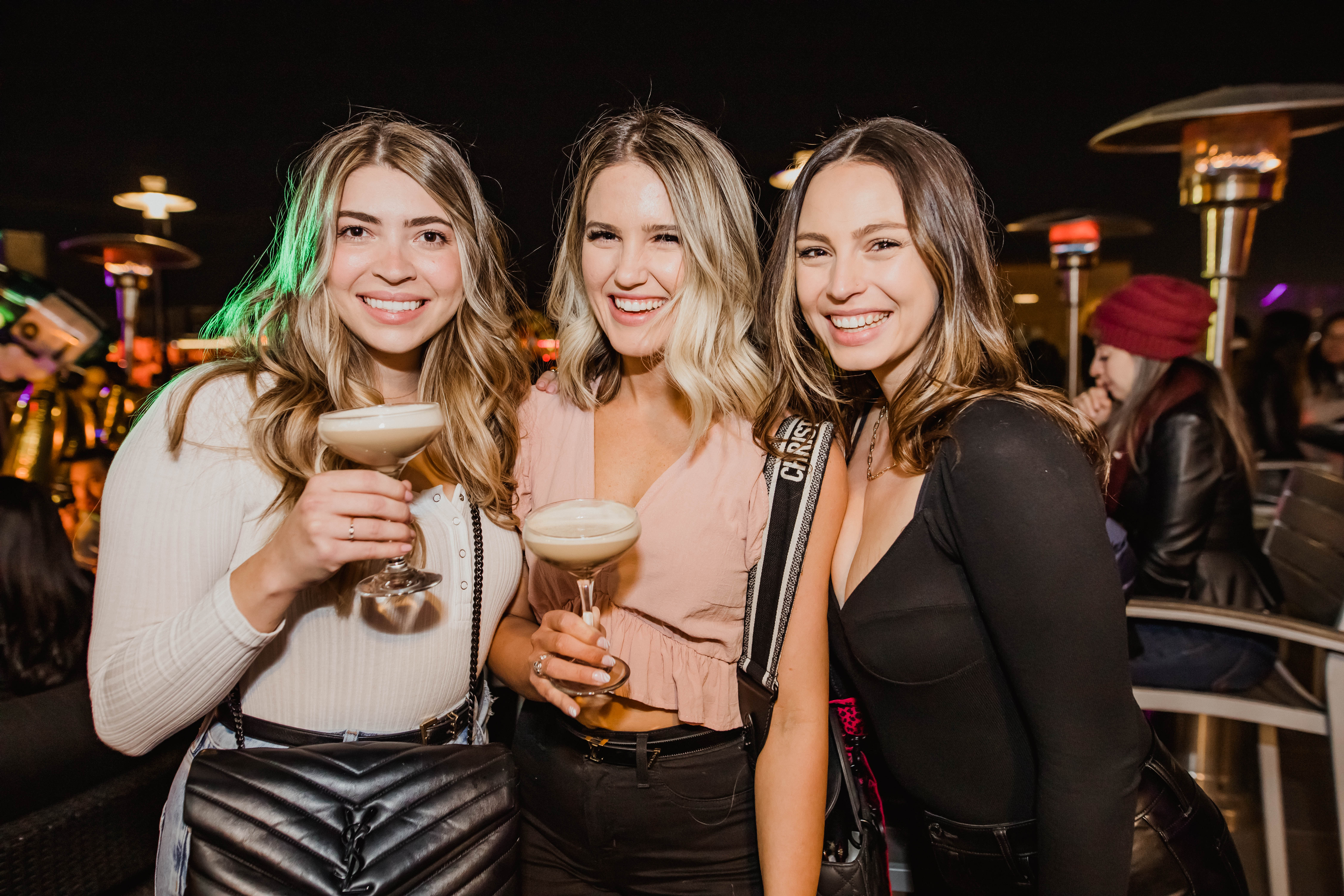 three woman posing for a photo