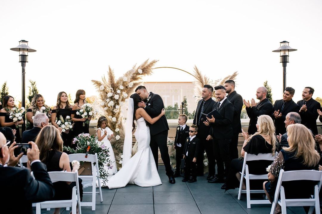 bride and groom kissing