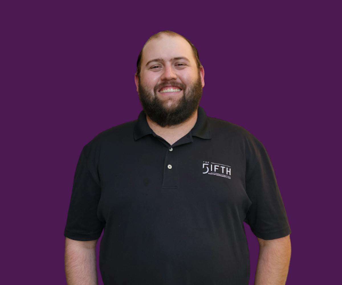 Bar Manager Jason with purple background