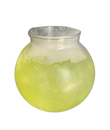 a blue cocktail with flowers in it