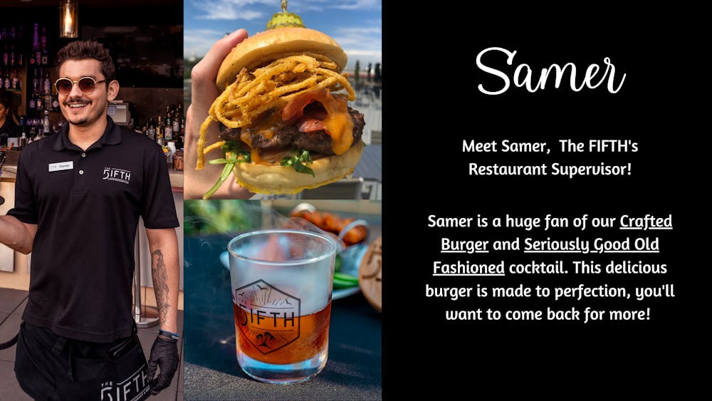 a person standing in front of a sandwich