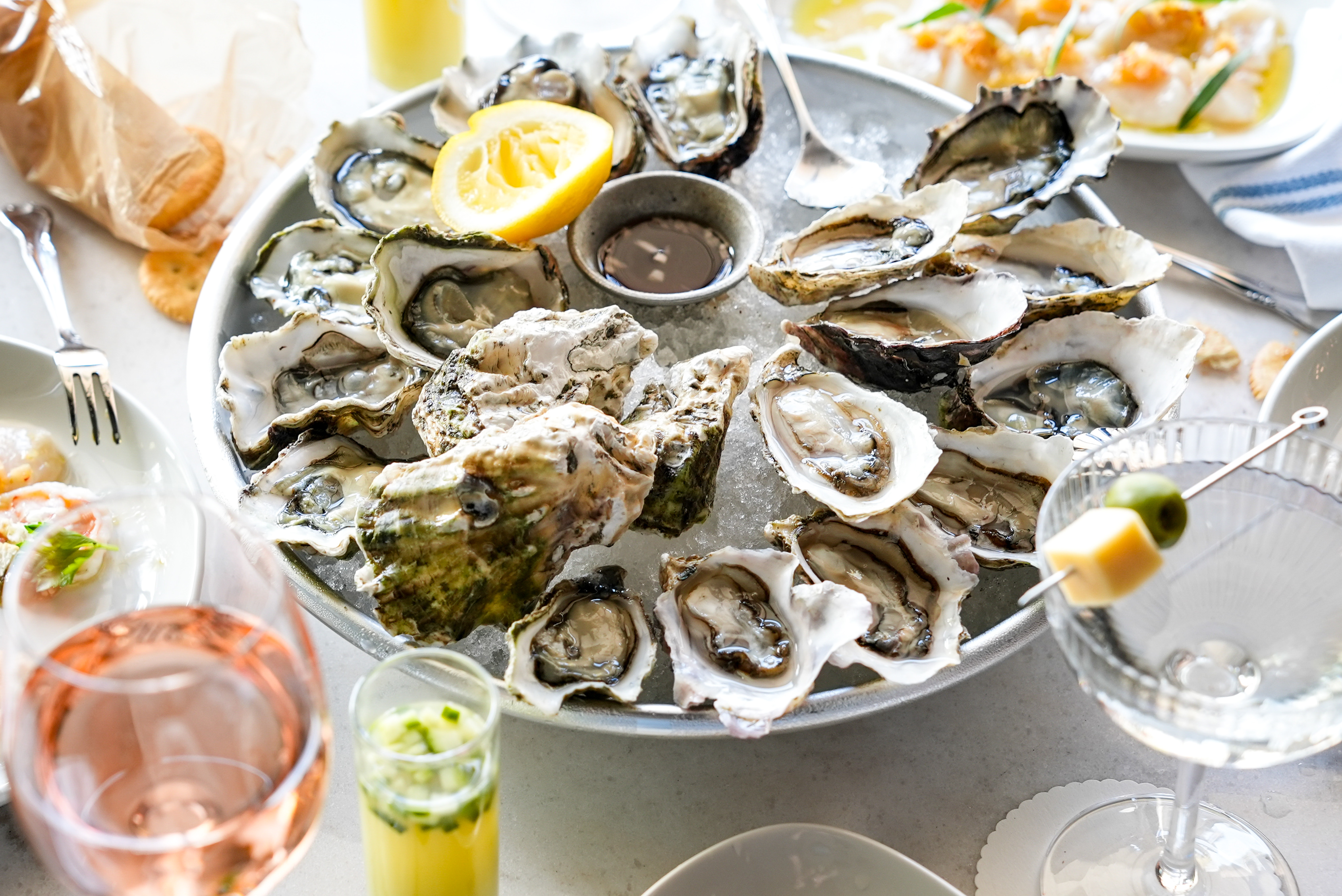 a plate of oysters on a table