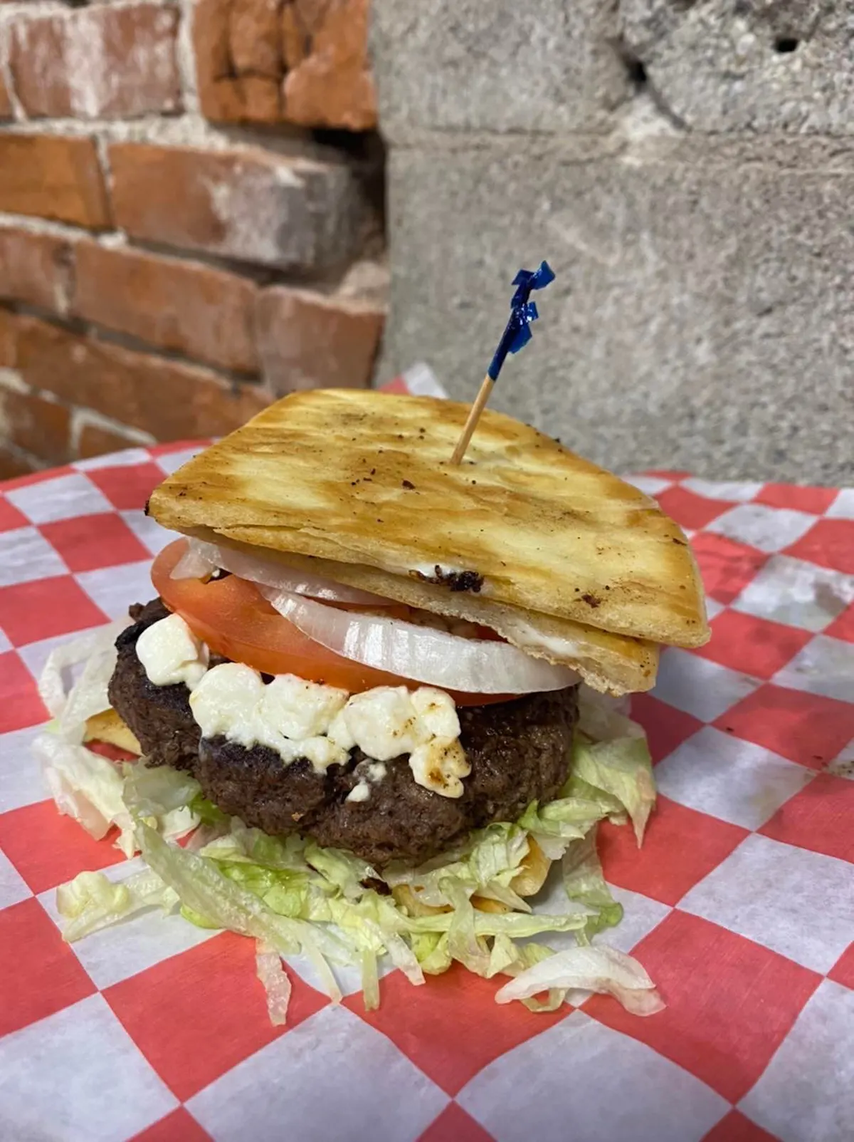 a cut in half sandwich sitting on top of a table