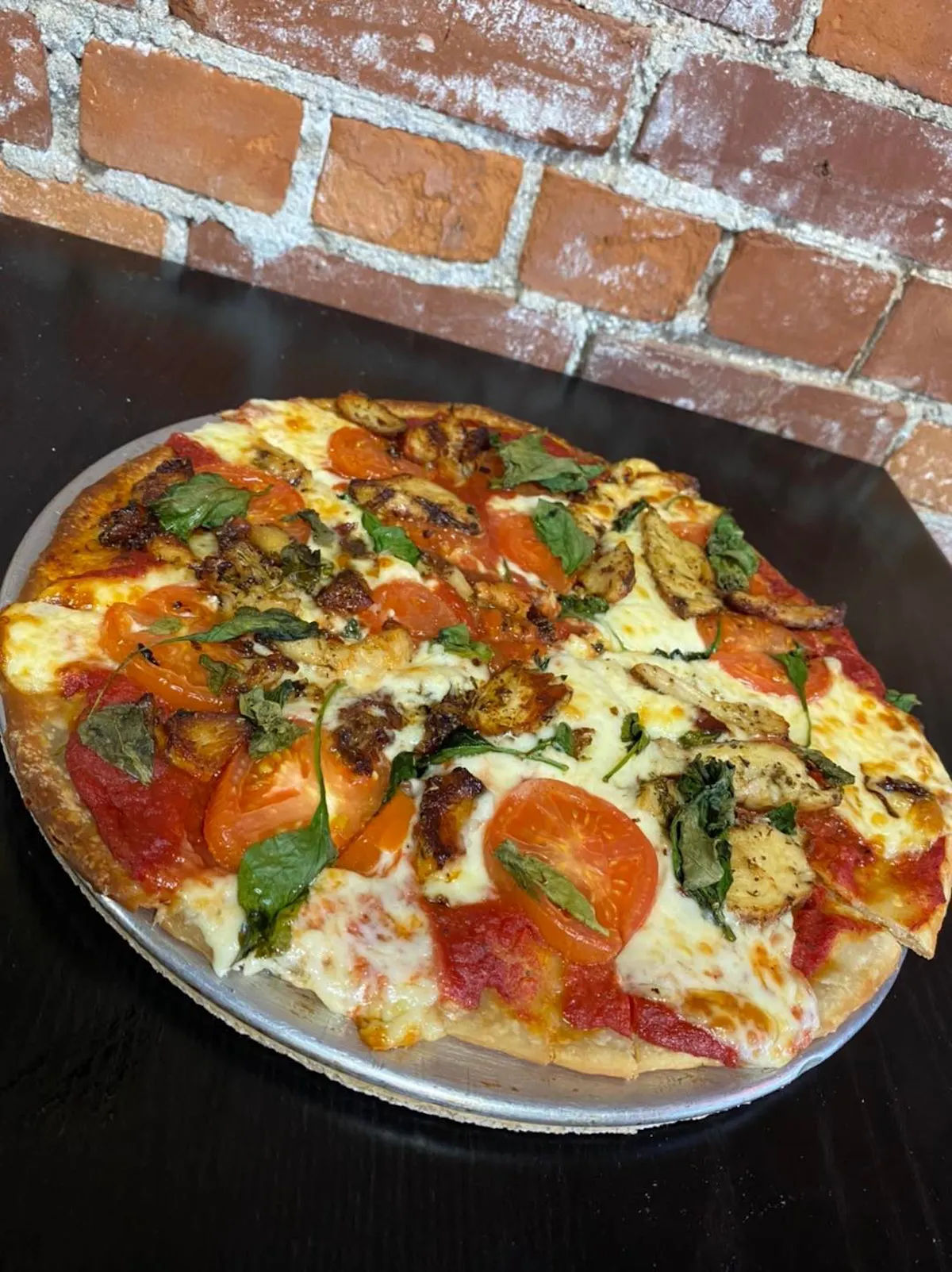 a pizza sitting on top of a table