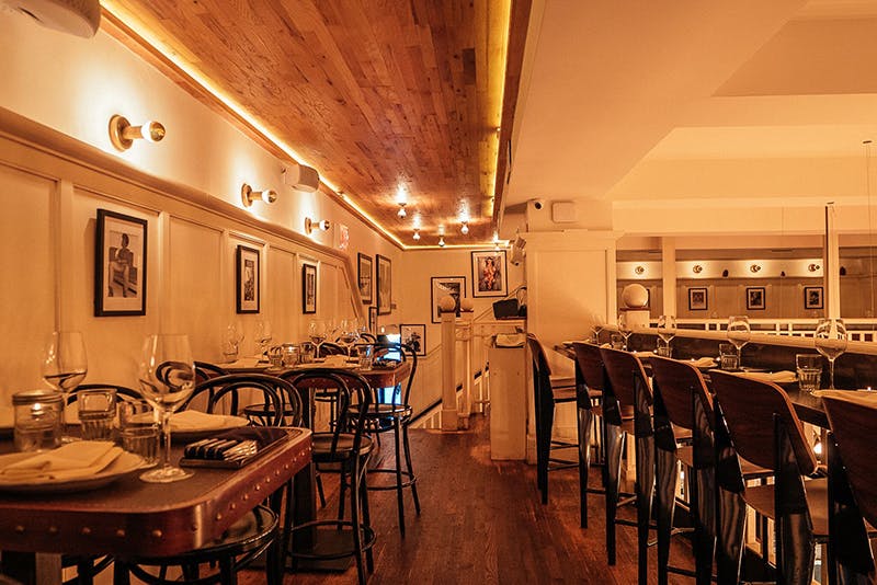 a kitchen with a dining room table