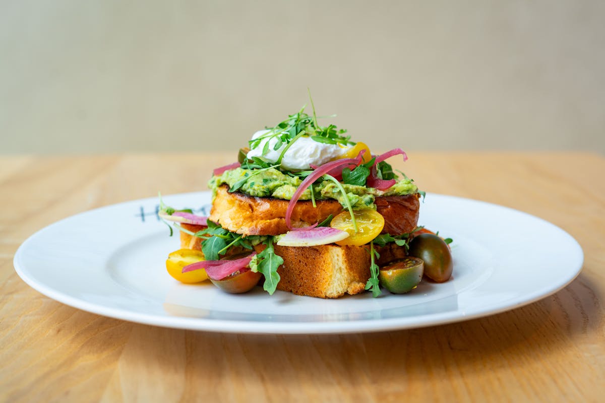 egg & avocado toast on a table