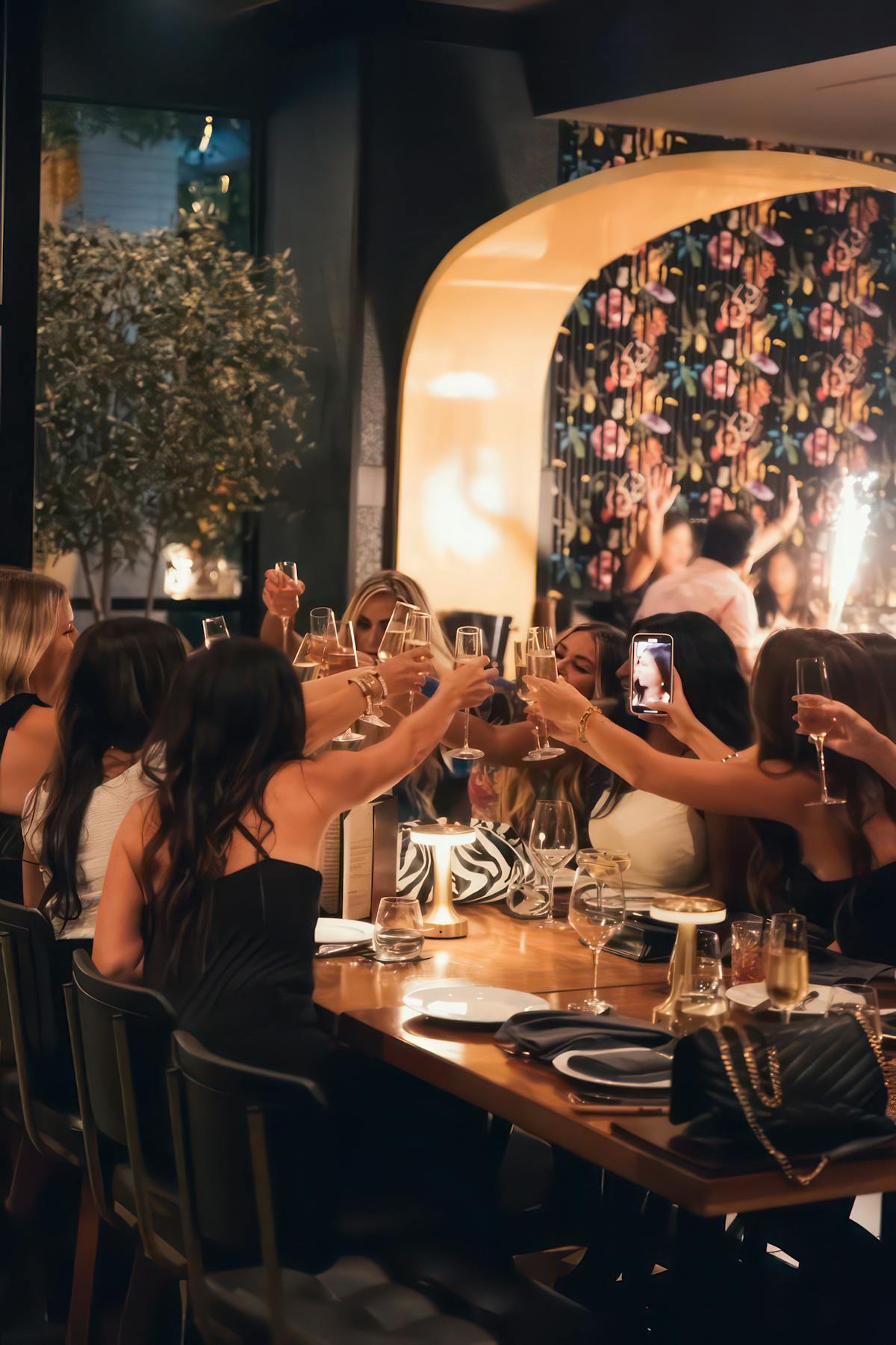 people cheering cocktails