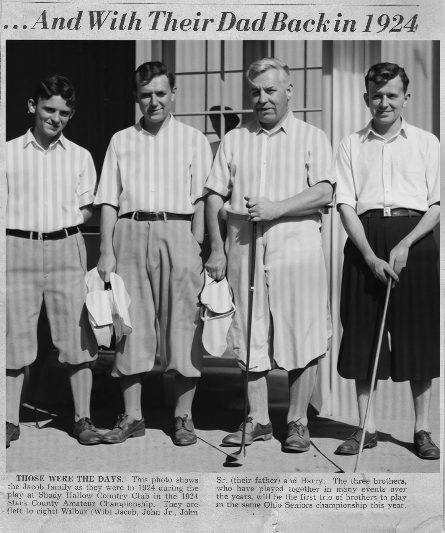 a group of men posing for the camera