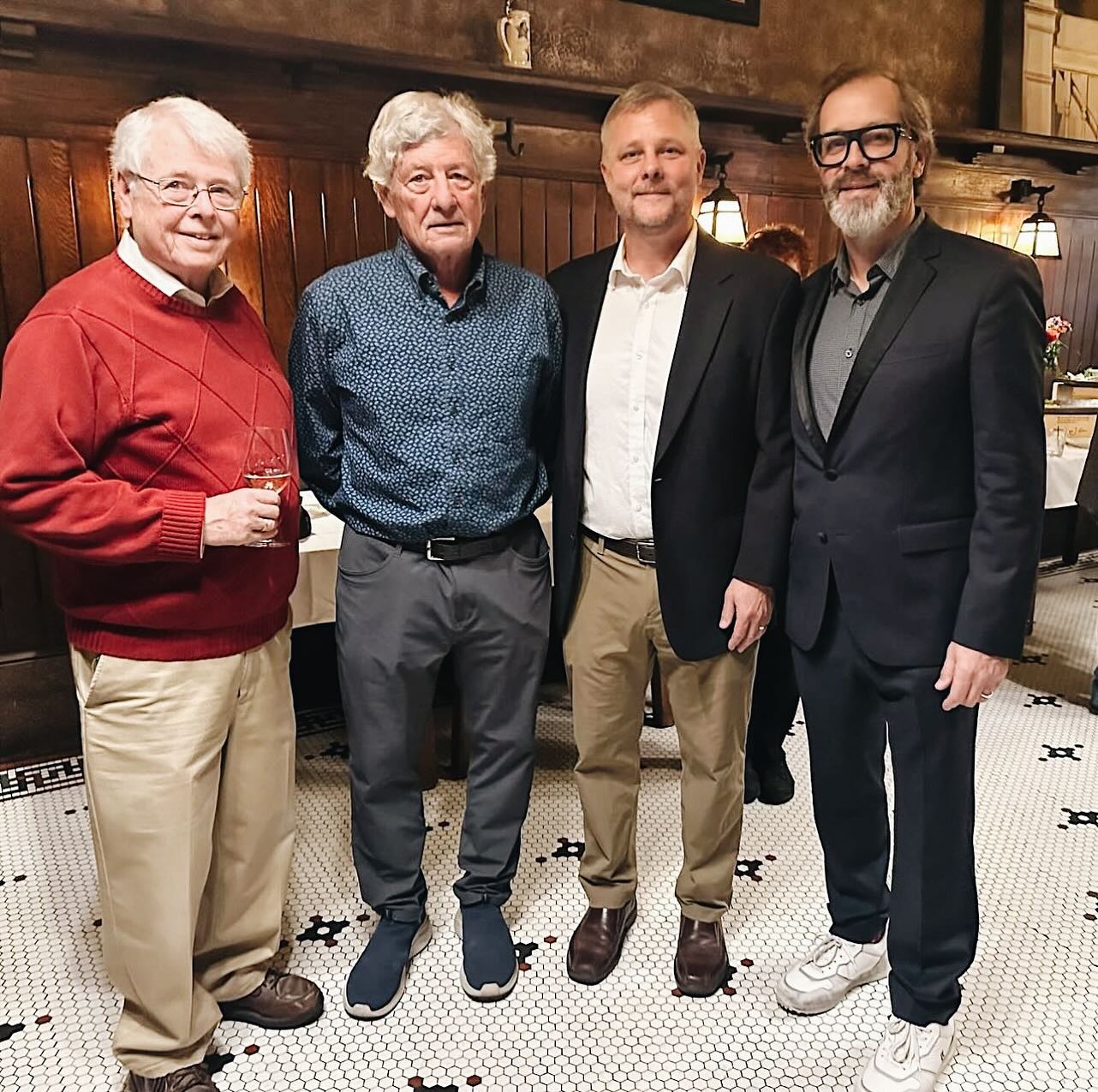 a group of people posing for the camera