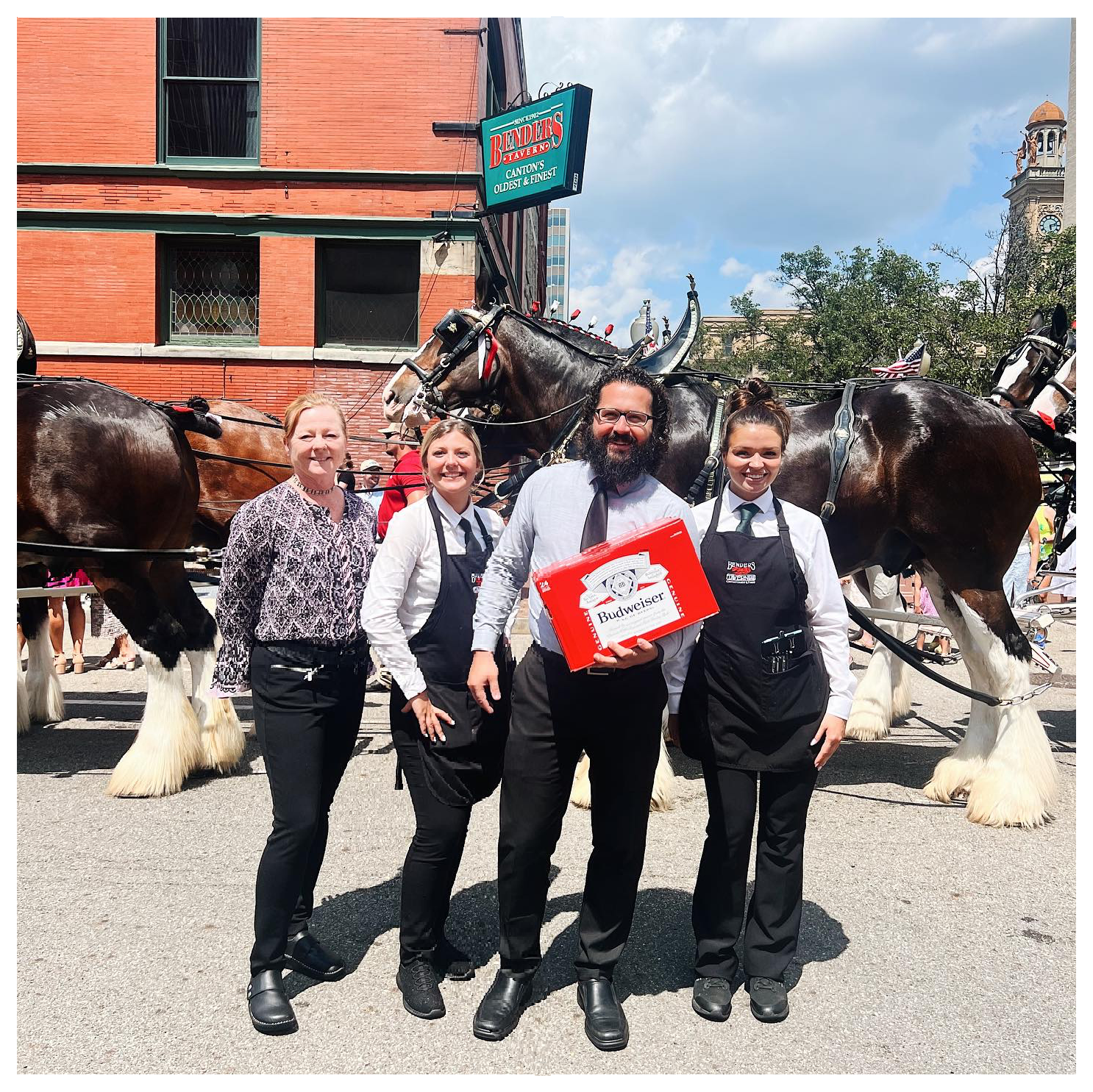 a group of people posing for the camera