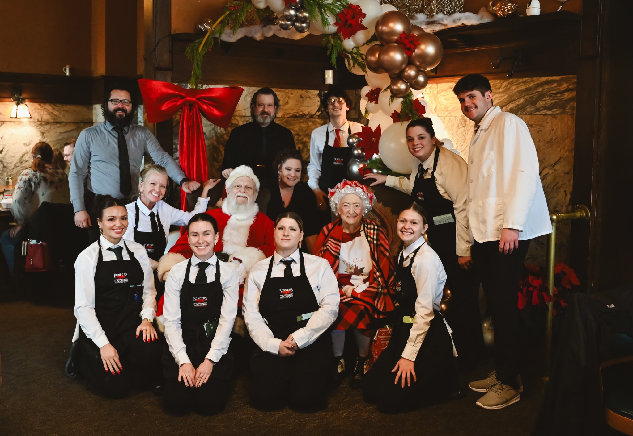 a group of people posing for the camera