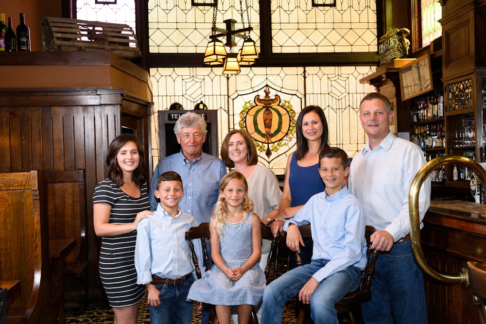 a group of people posing for a photo