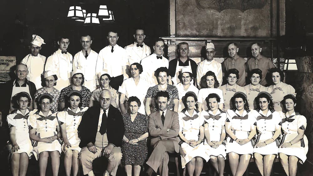 a group of people posing for the camera