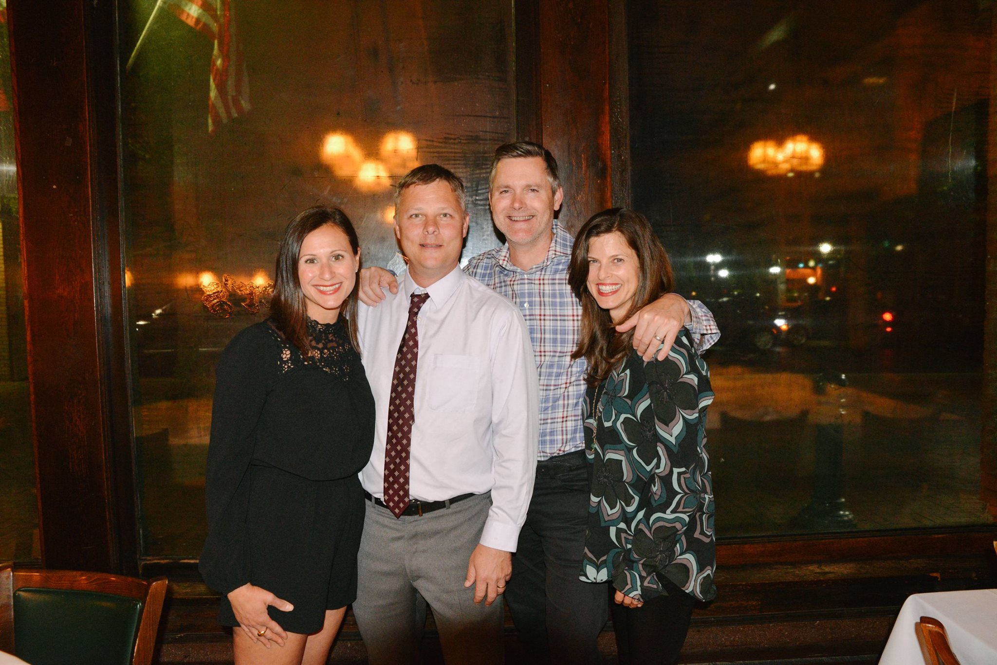 a group of people posing for the camera