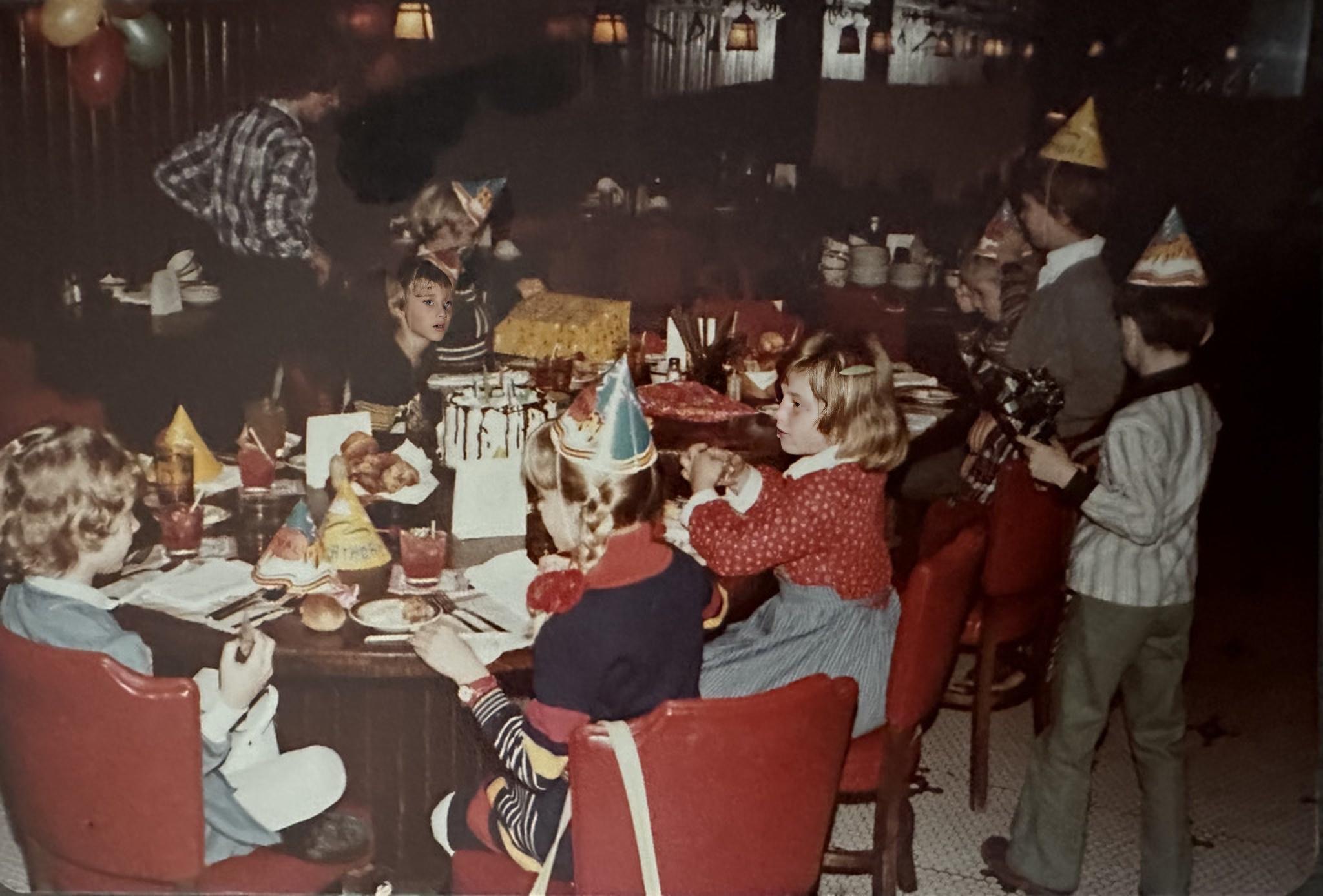a group of kids at a birthday party