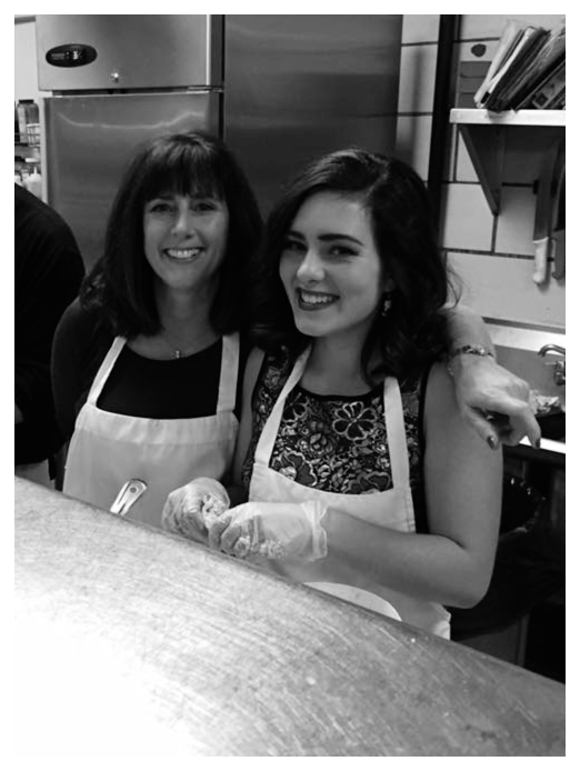 two women posing for the camera